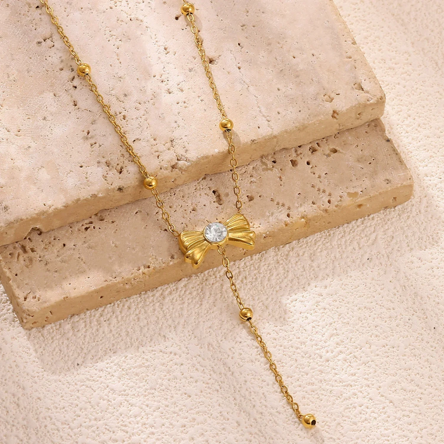 Gold Beaded Bow Crystal Necklace - Image 3