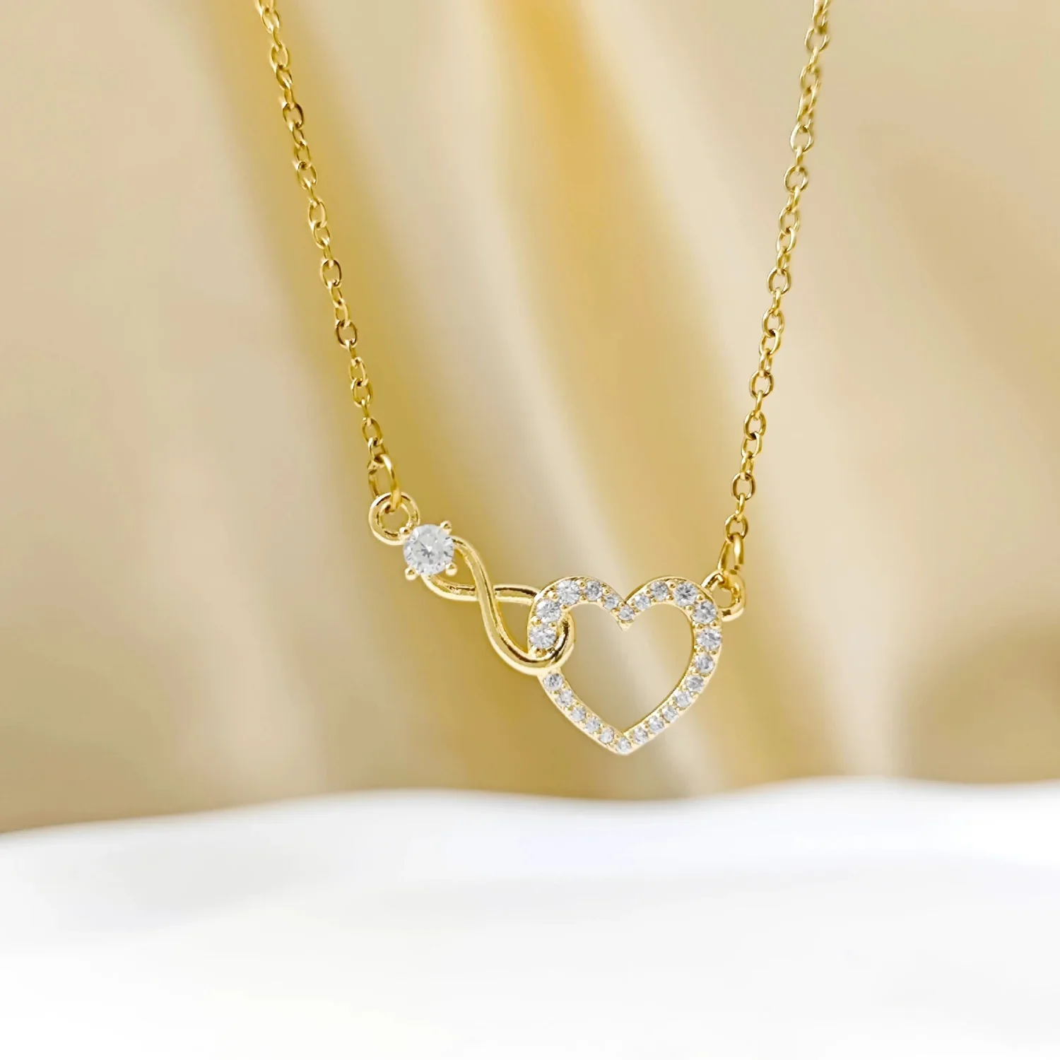 Gold Crystal Heart Infinity Necklace - Image 2