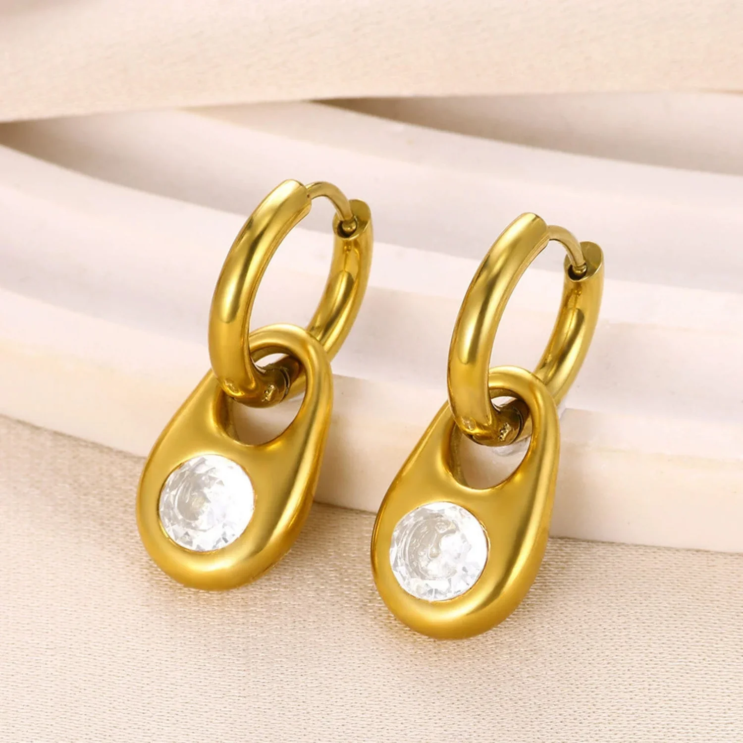 Gold Crystal Teardrop Huggie Earrings - Image 4