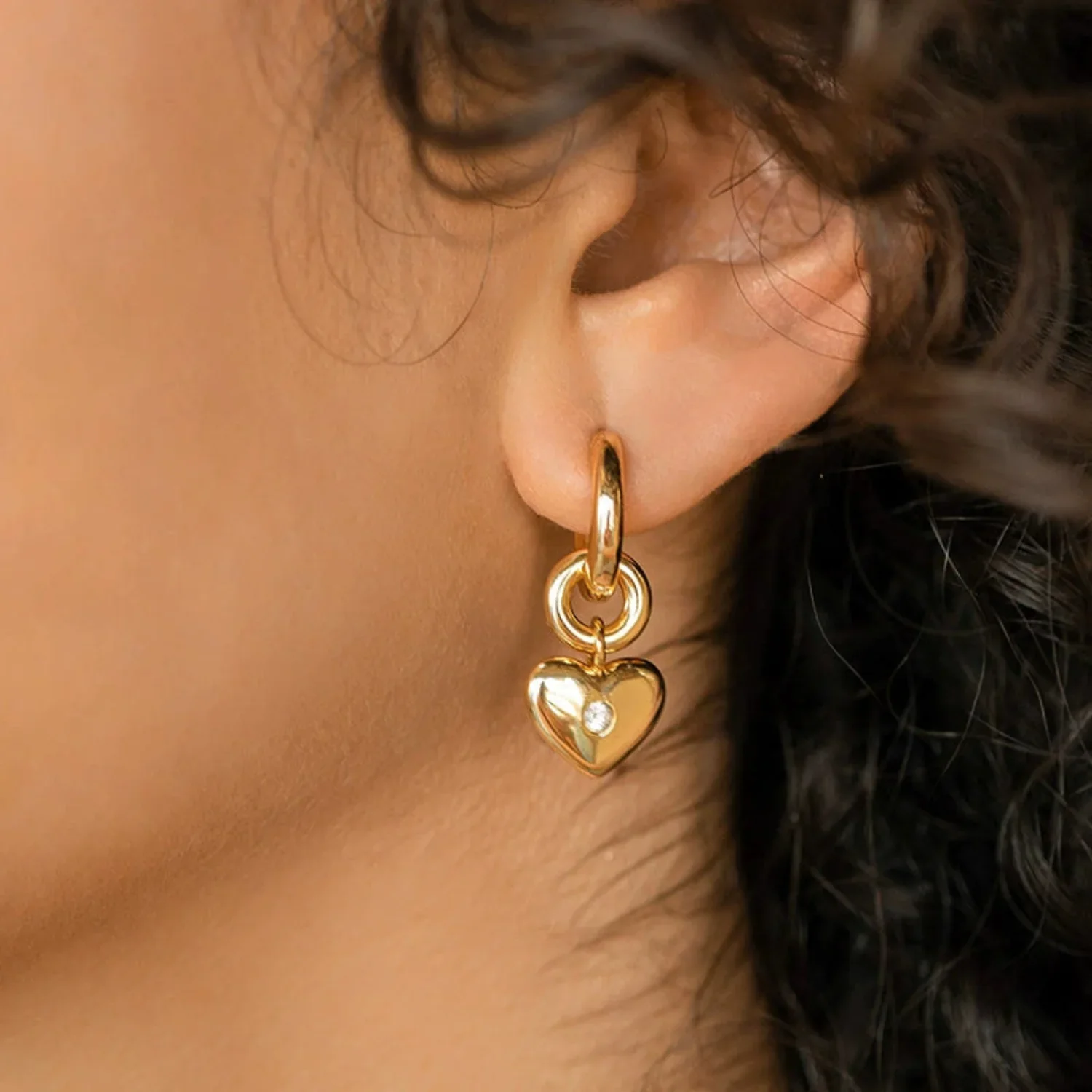 Gold Heart Huggie Hoop Earrings - Image 2