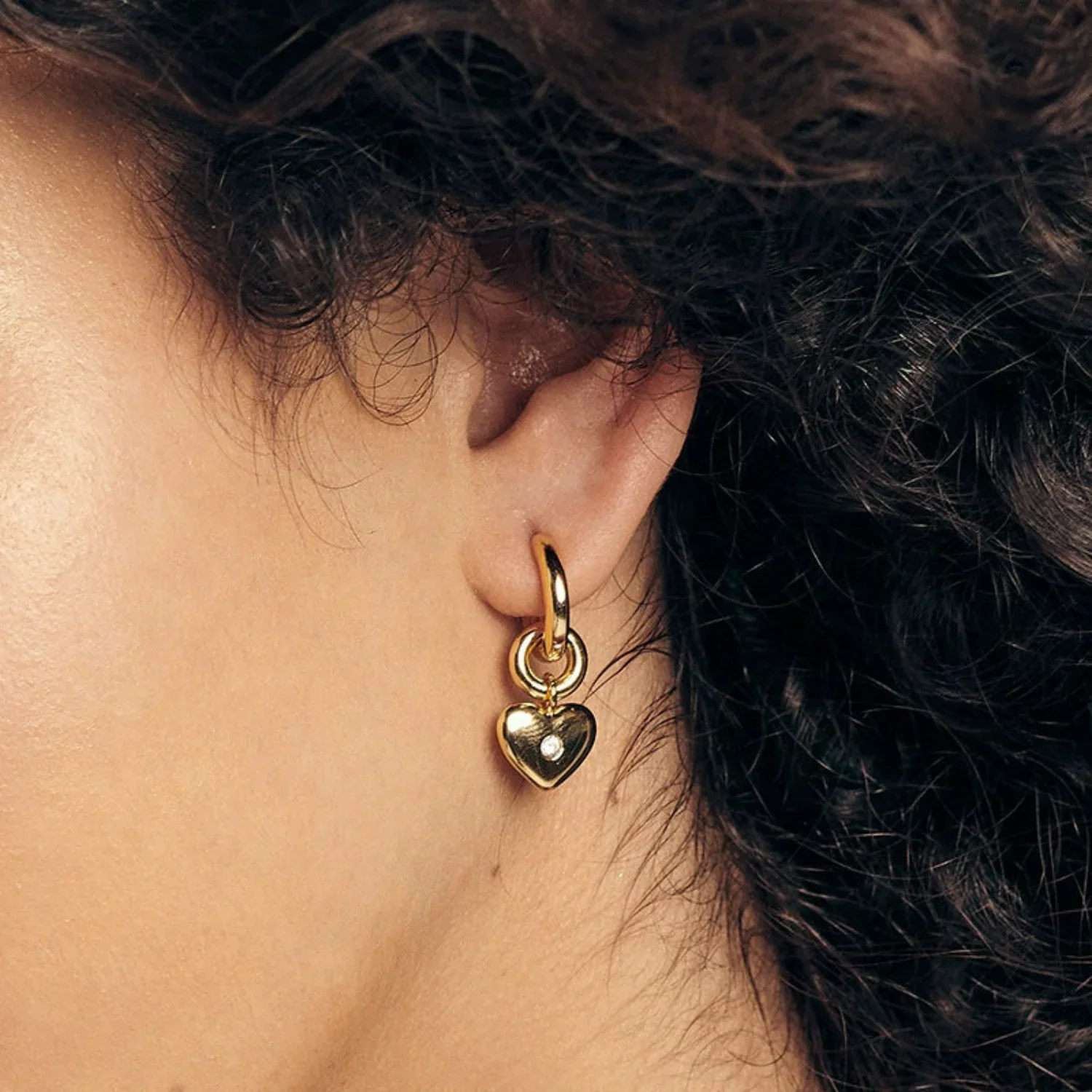 Gold Heart Huggie Hoop Earrings - Image 3