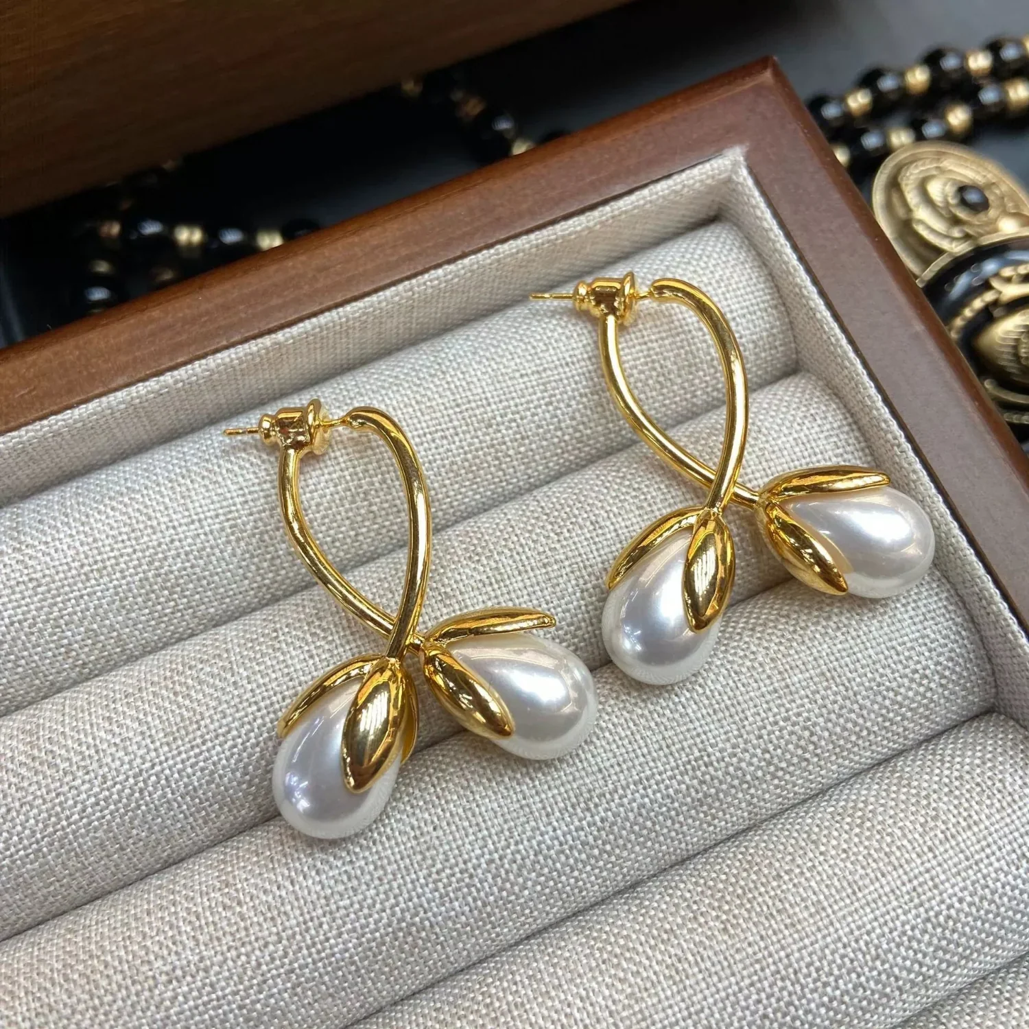 Gold Pearl Bud Drop Earrings - Image 2