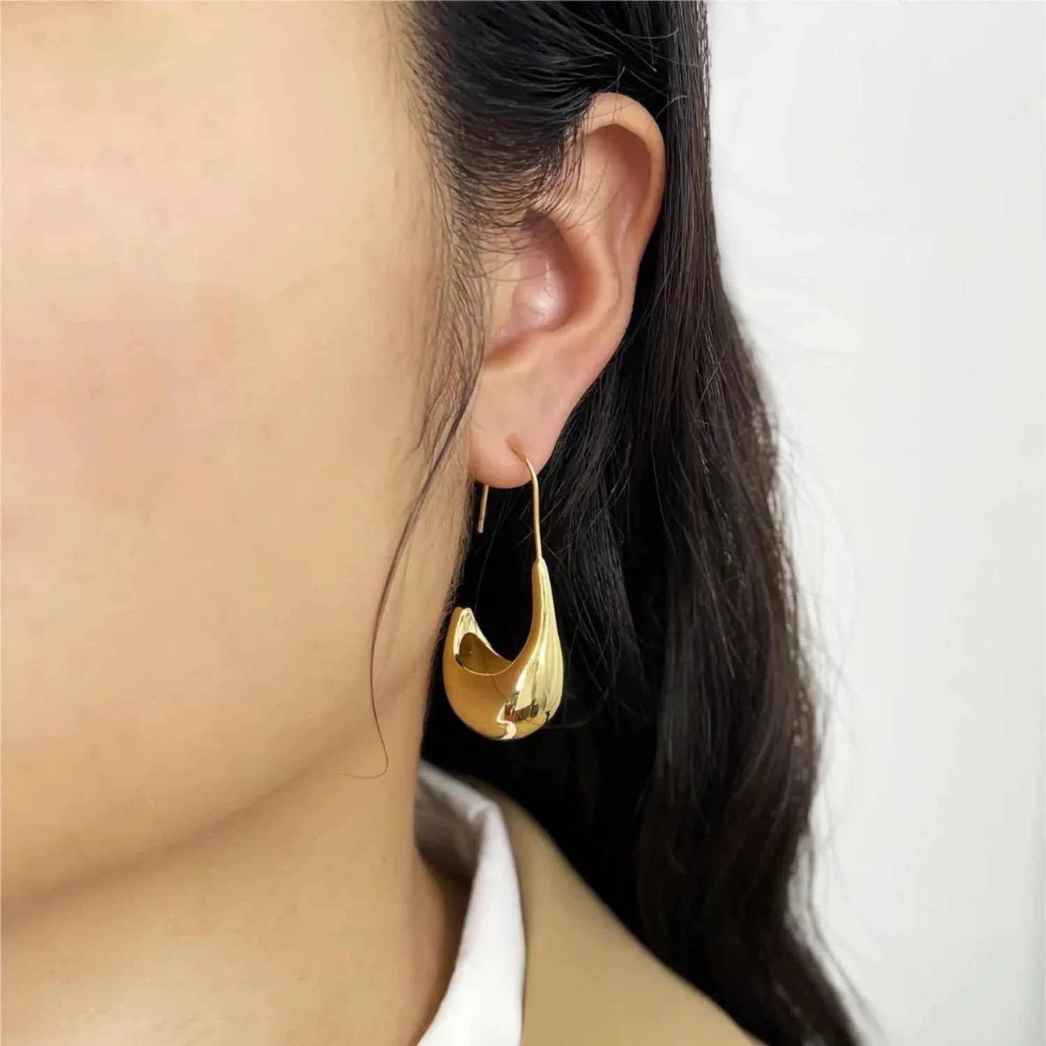 Gold Sculptural Crescent Hoop Earrings - Image 2