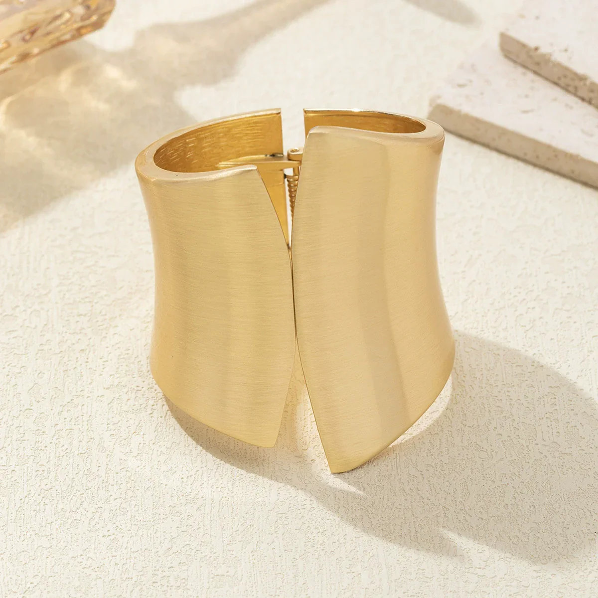 Gold Tone Flared Cuff Bracelet With Modern Design