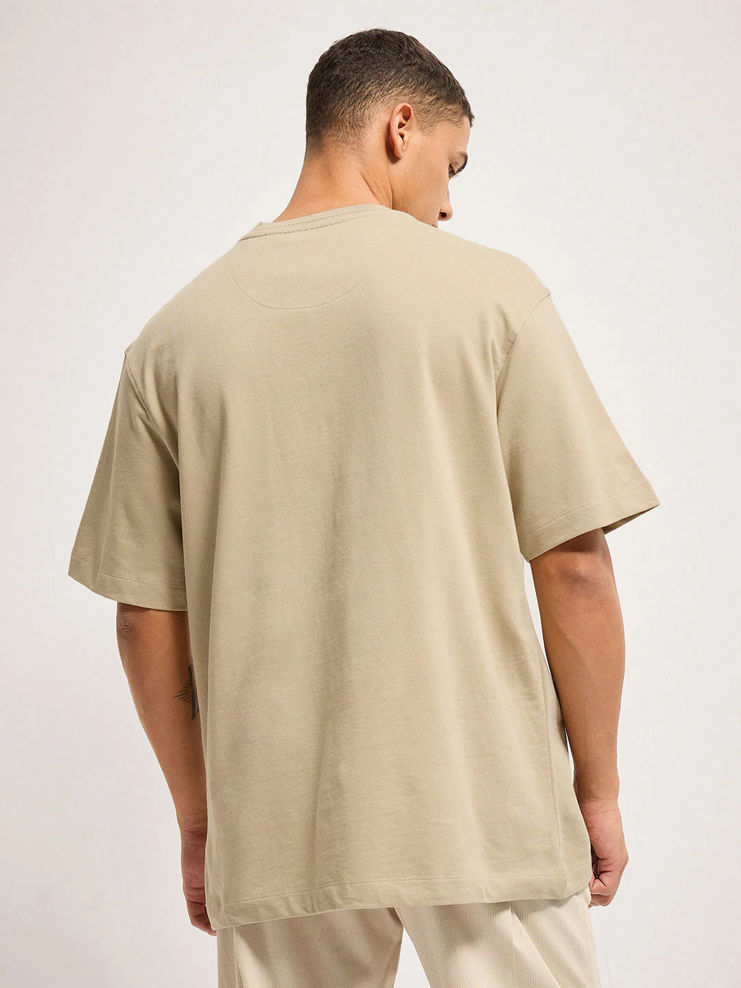 Men Beige signature raised design Crew Neck T-Shirt - Image 2
