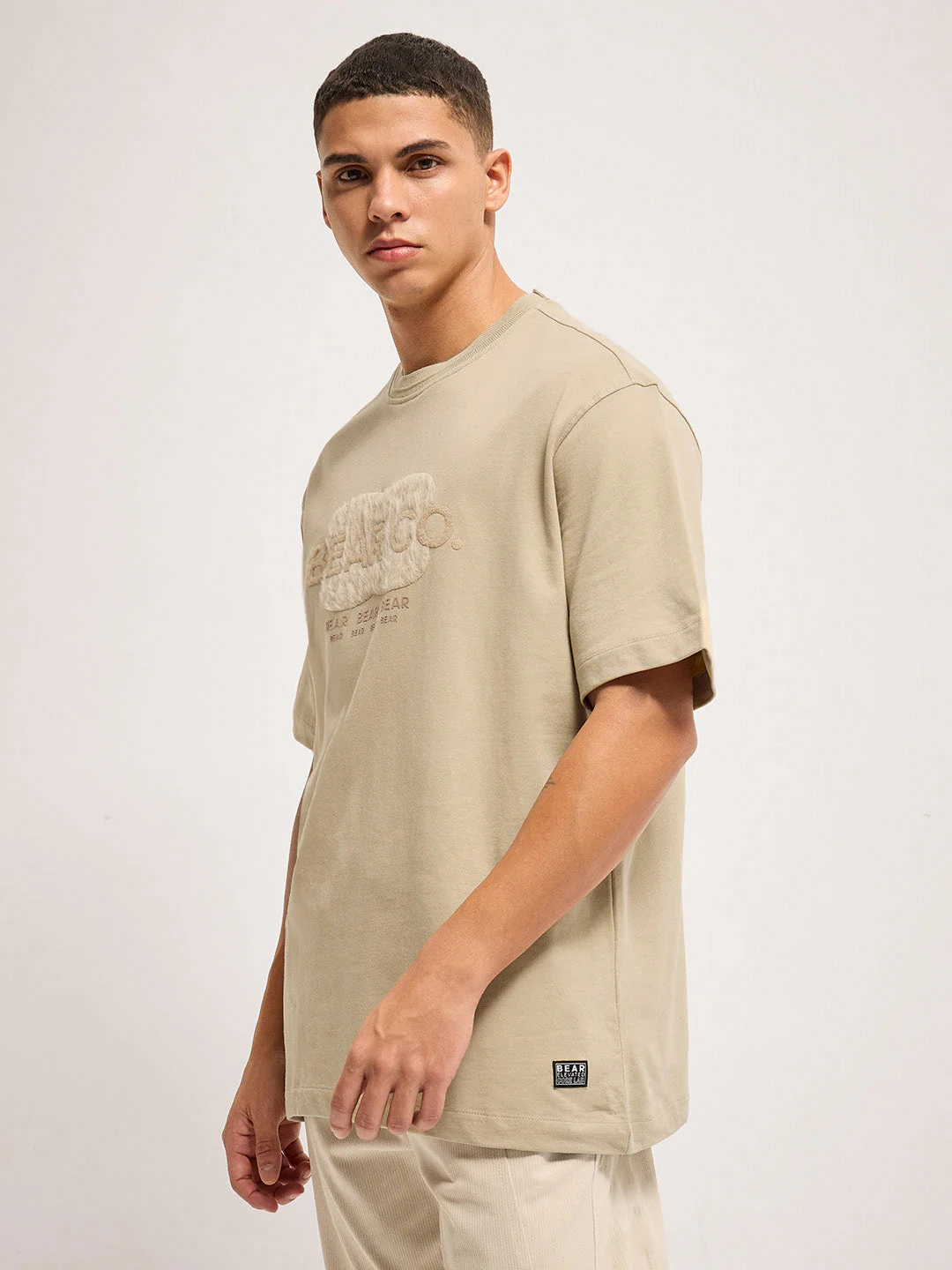 Men Beige signature raised design Crew Neck T-Shirt - Image 3