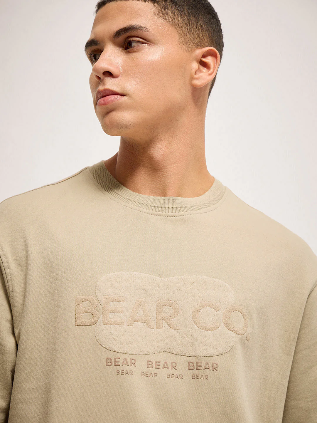 Men Beige signature raised design Crew Neck T-Shirt - Image 4
