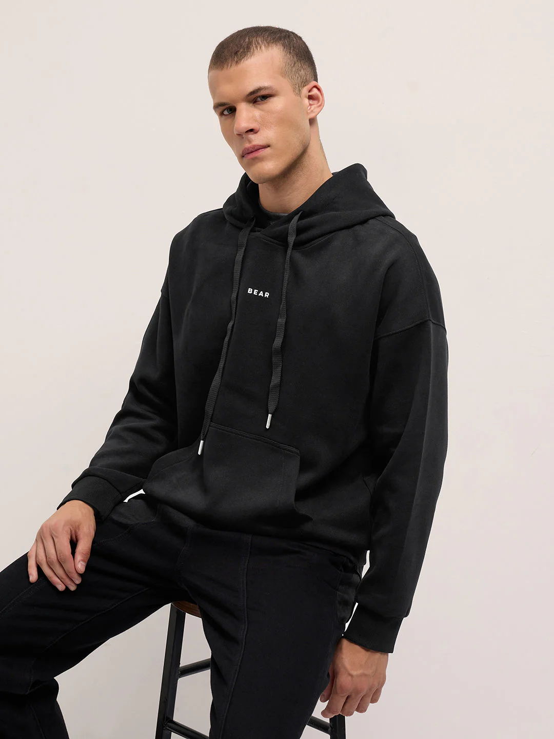 Men Black Solid Relax Fit Hoodie