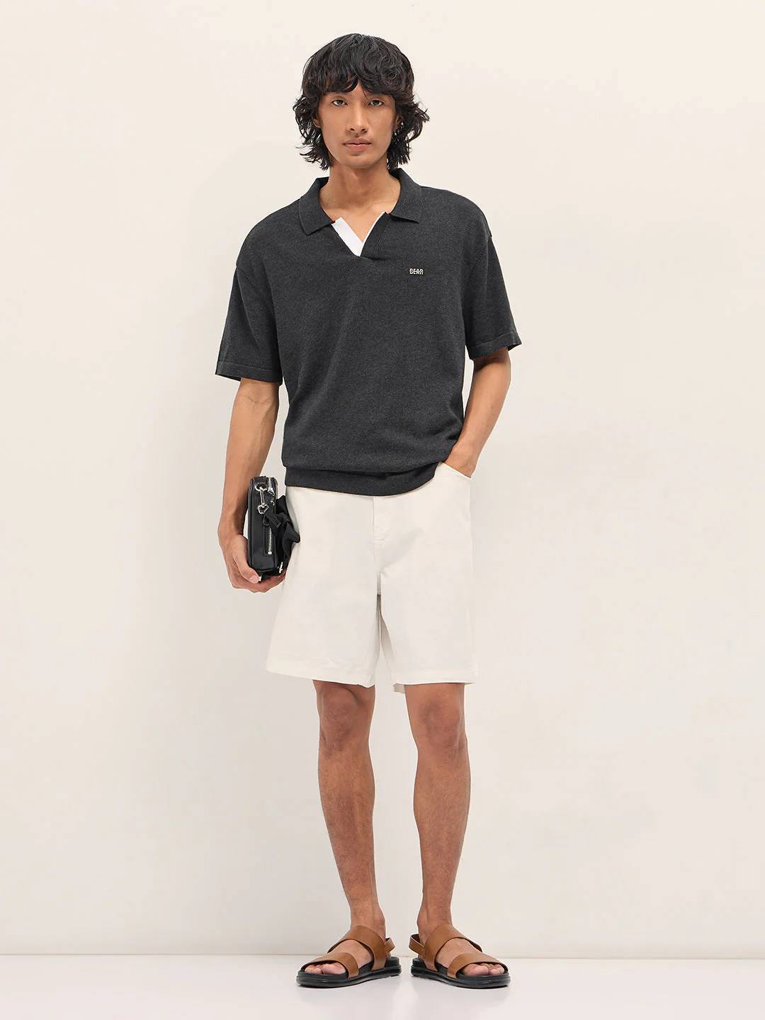 Men Black Solid Relaxed Fit Polo - Image 4