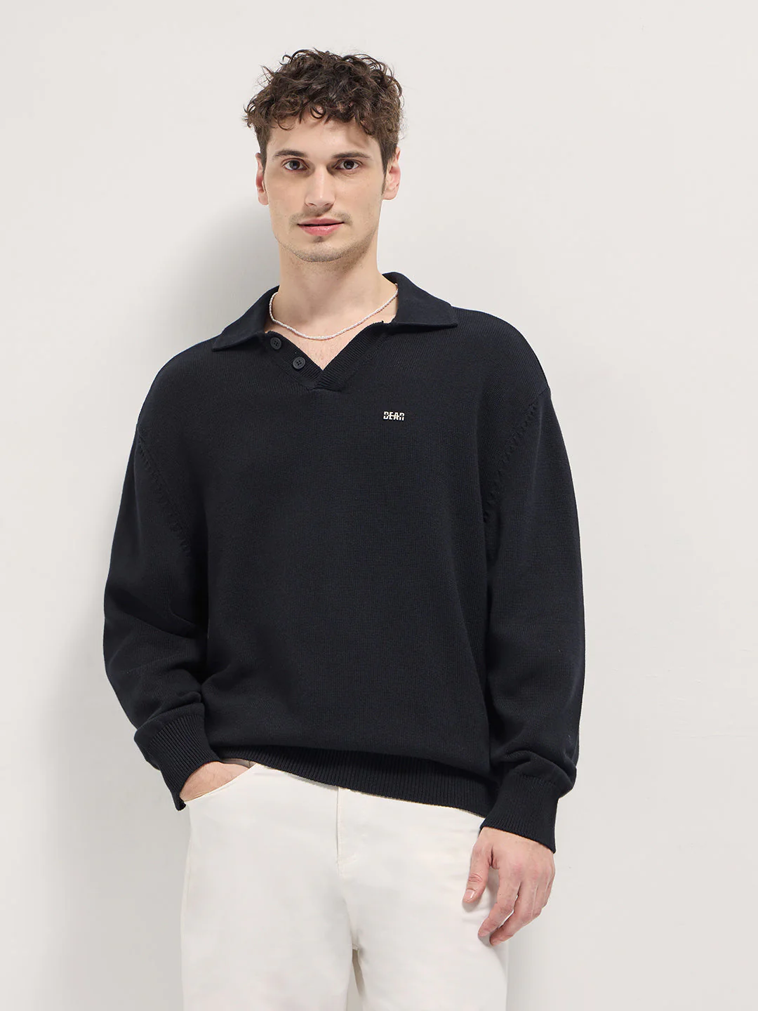 Men Black Textured Knit Relaxed Fit Polo