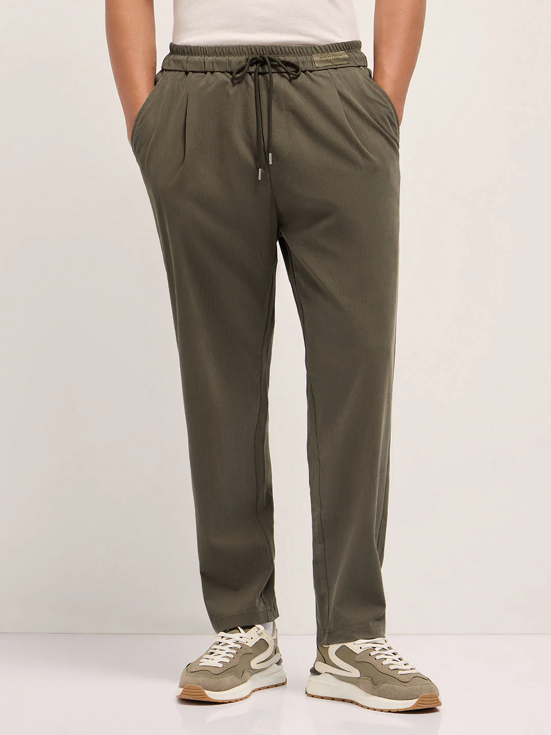 Men Olive Solid Lyocell Casual Trousers - Image 7