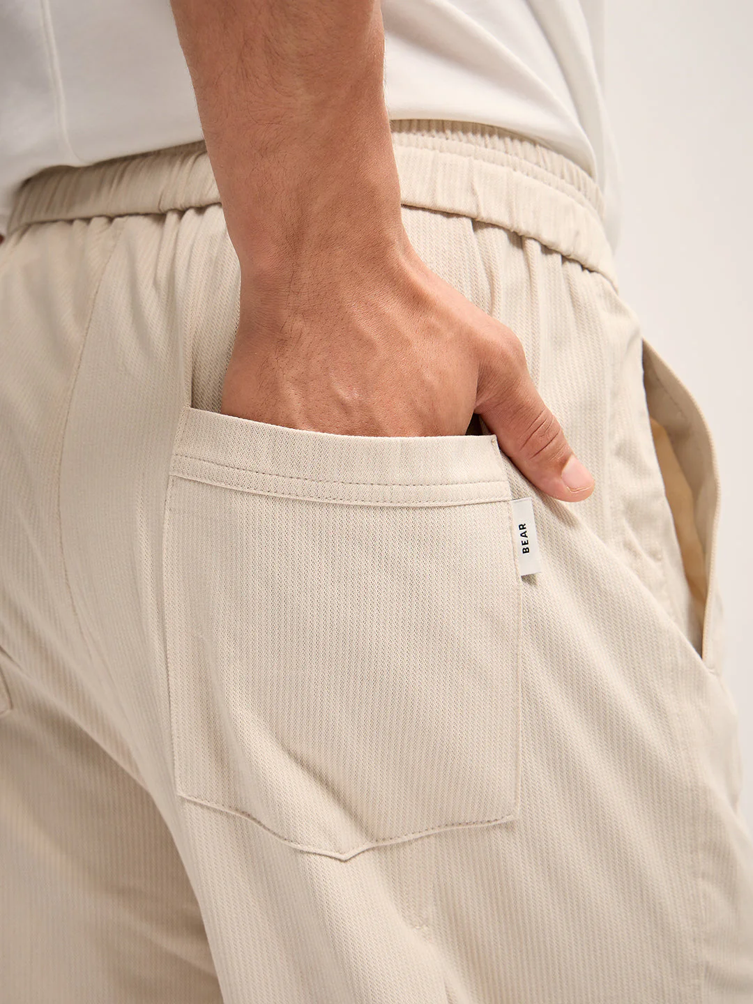 Men Cream Self Design Regular Fit Mid-Rise Casual Pant - Image 6