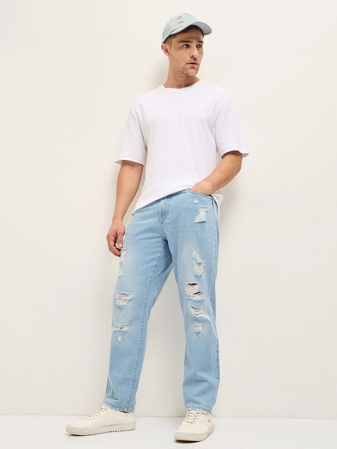 Men Light BlueLight Fade High Distressed Mid-Rise Relaxed Fit Jeans - Image 4