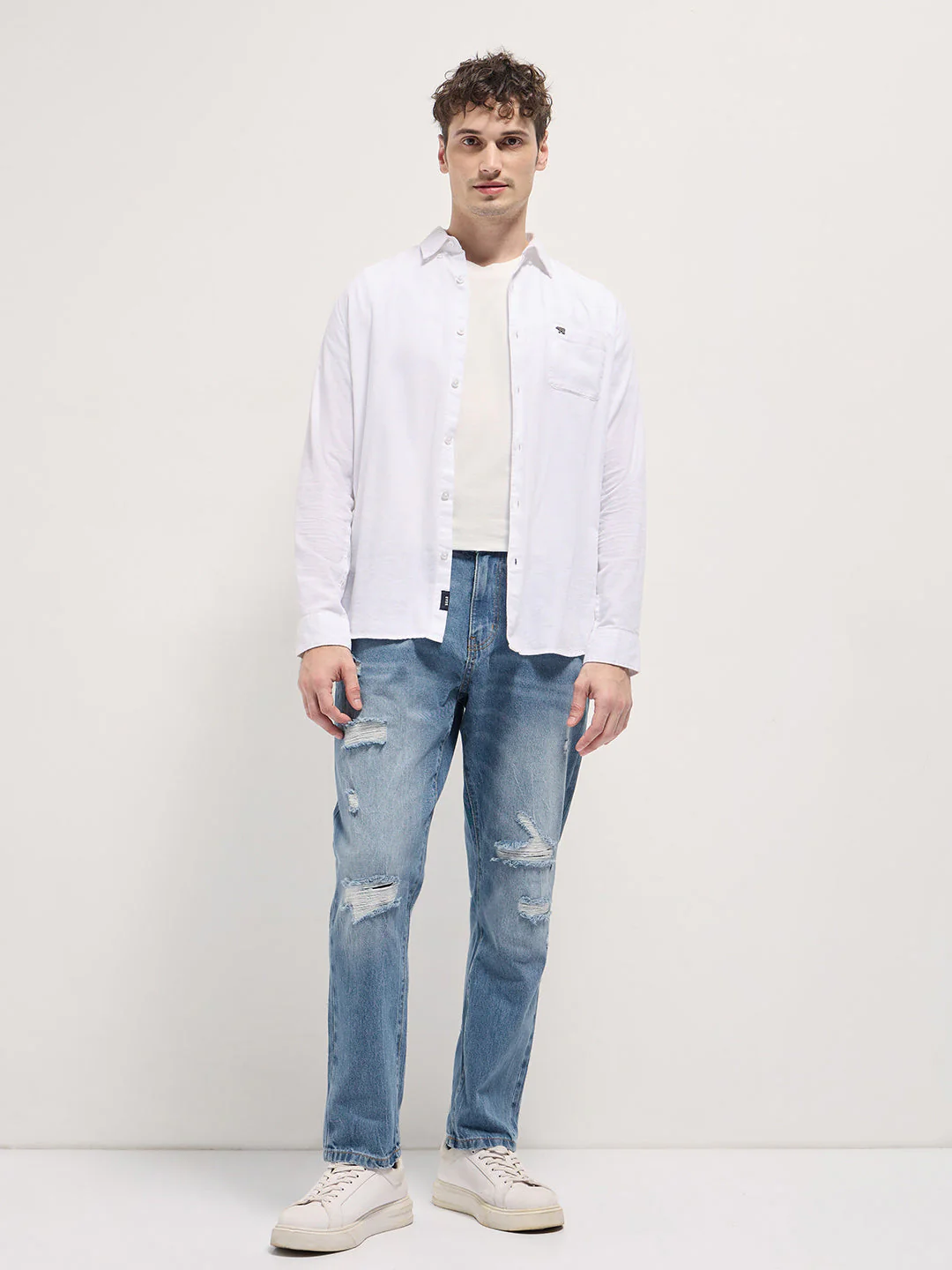 Men Light BlueLight Fade High Distressed Mid-Rise Relaxed Fit Jeans - Image 4