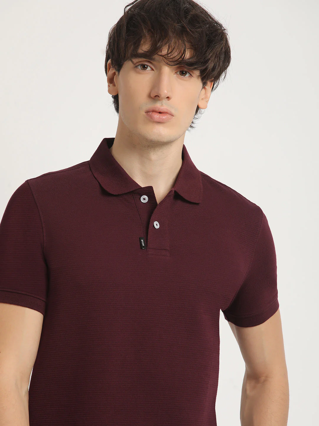 Men Maroon Self Design Regular Fit Polo Collar Tshirt