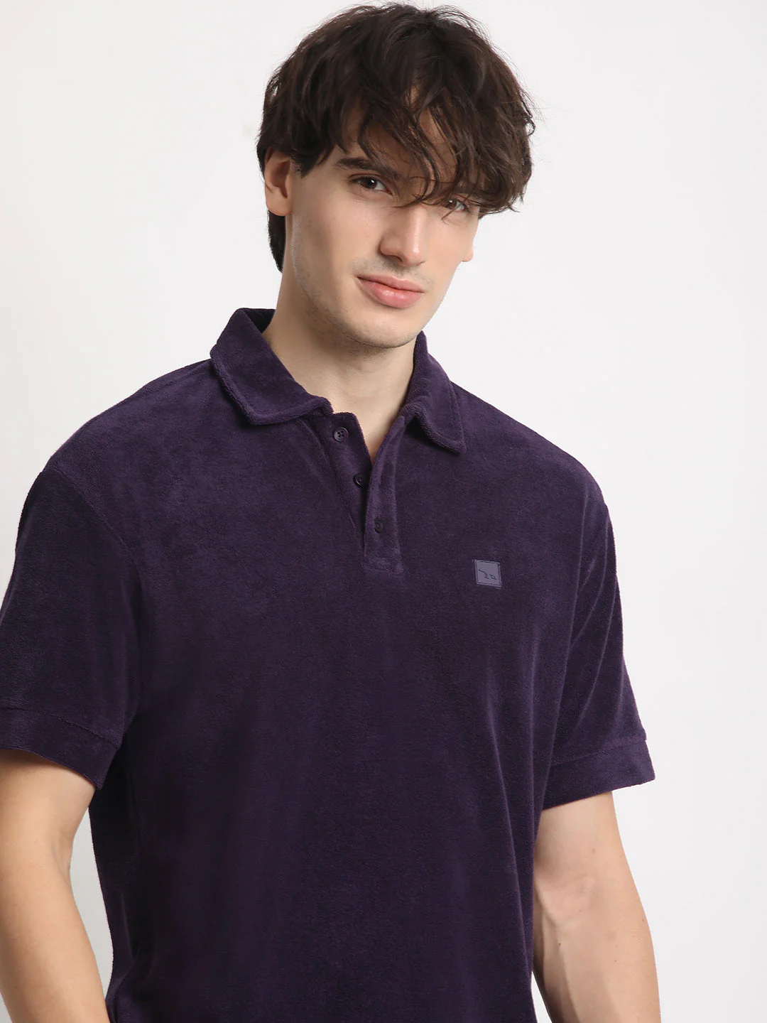 Men Purple Solid Relaxed Fit Polo T-shirt