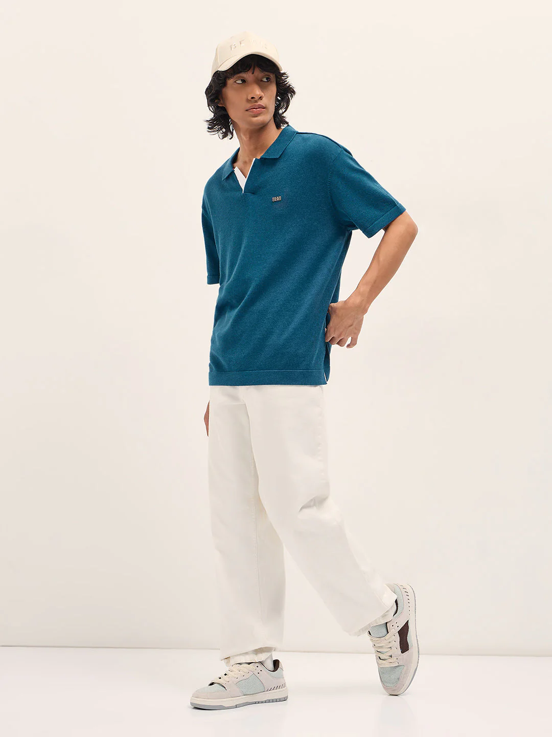 Men Teal Solid Relaxed Fit Polo - Image 4