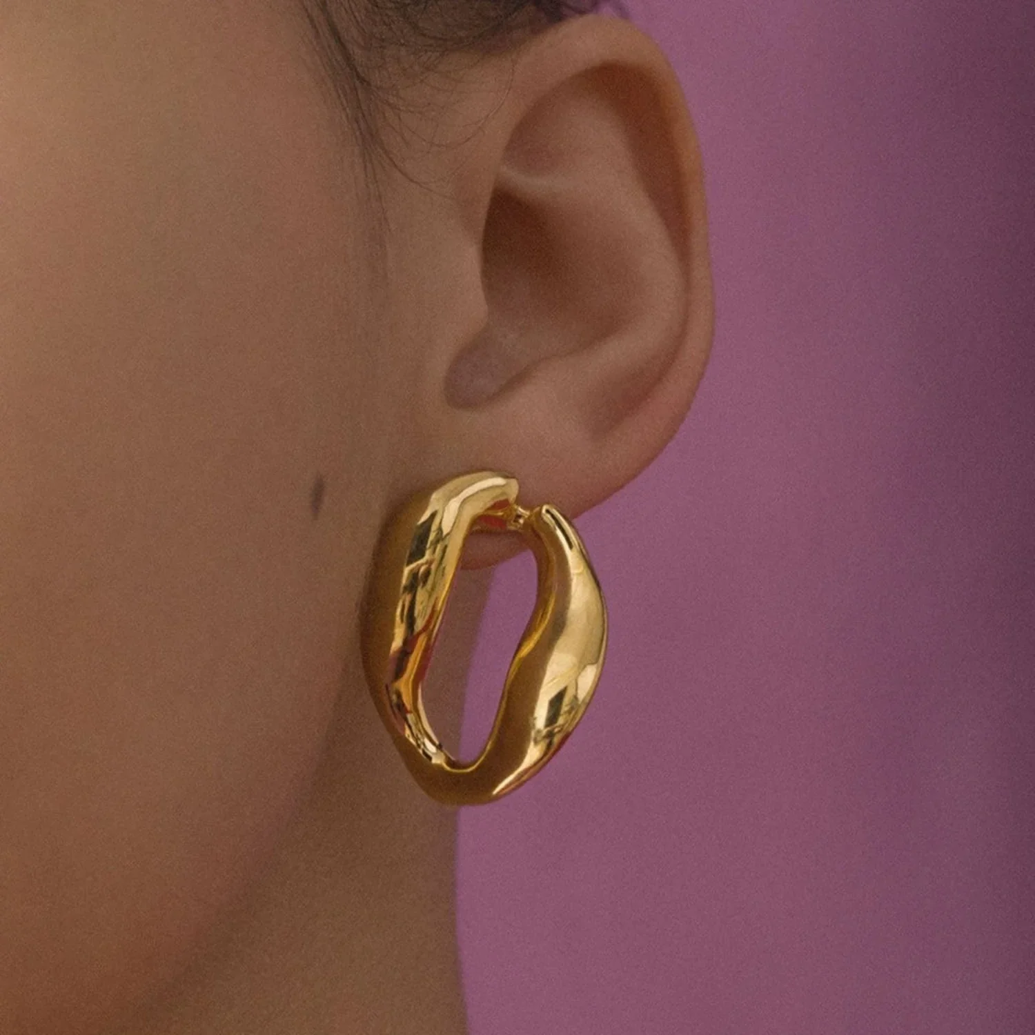 Oversized Oval Huggie Stud Earrings - Image 4