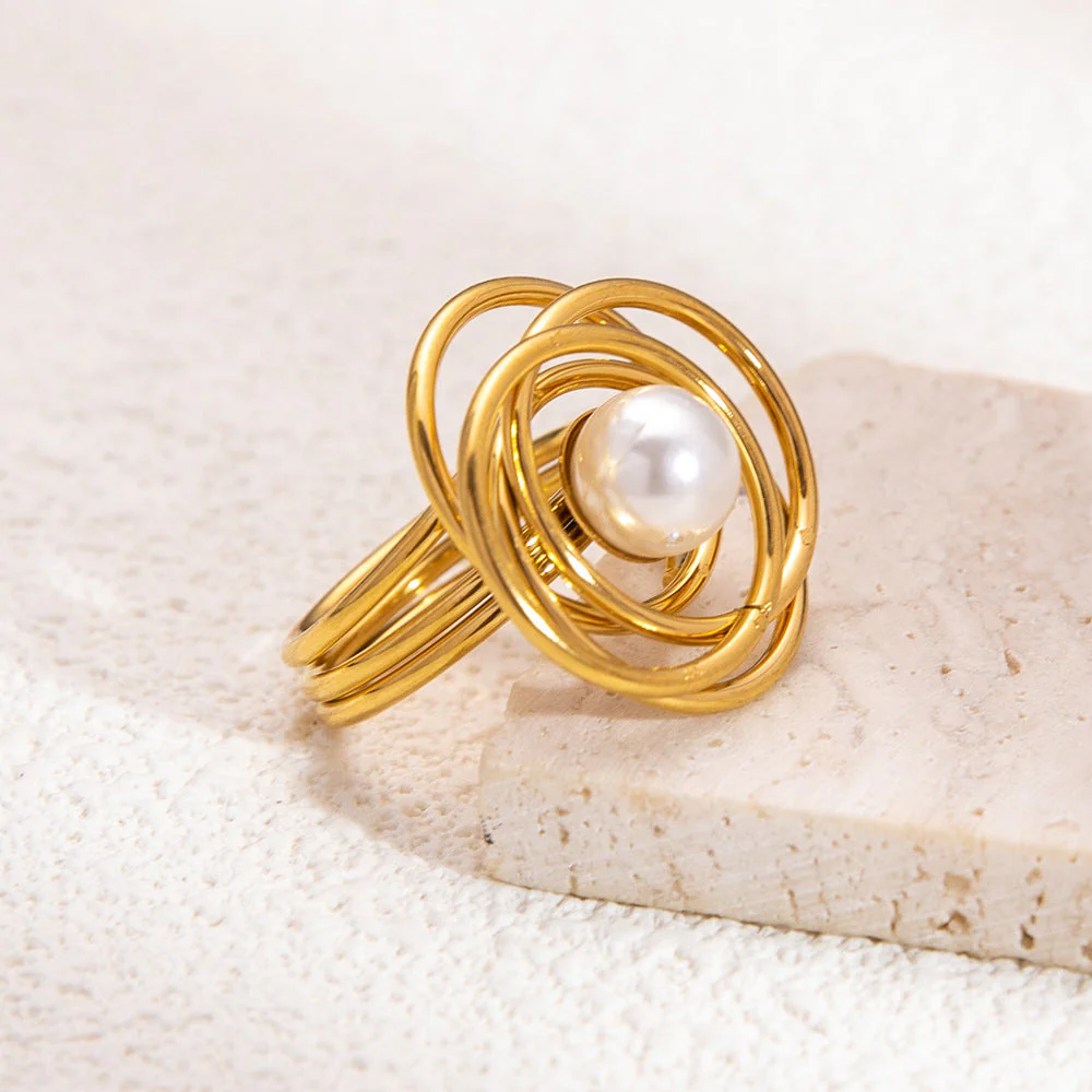 Pearl With Multi Circular Overlayered Gold Ring