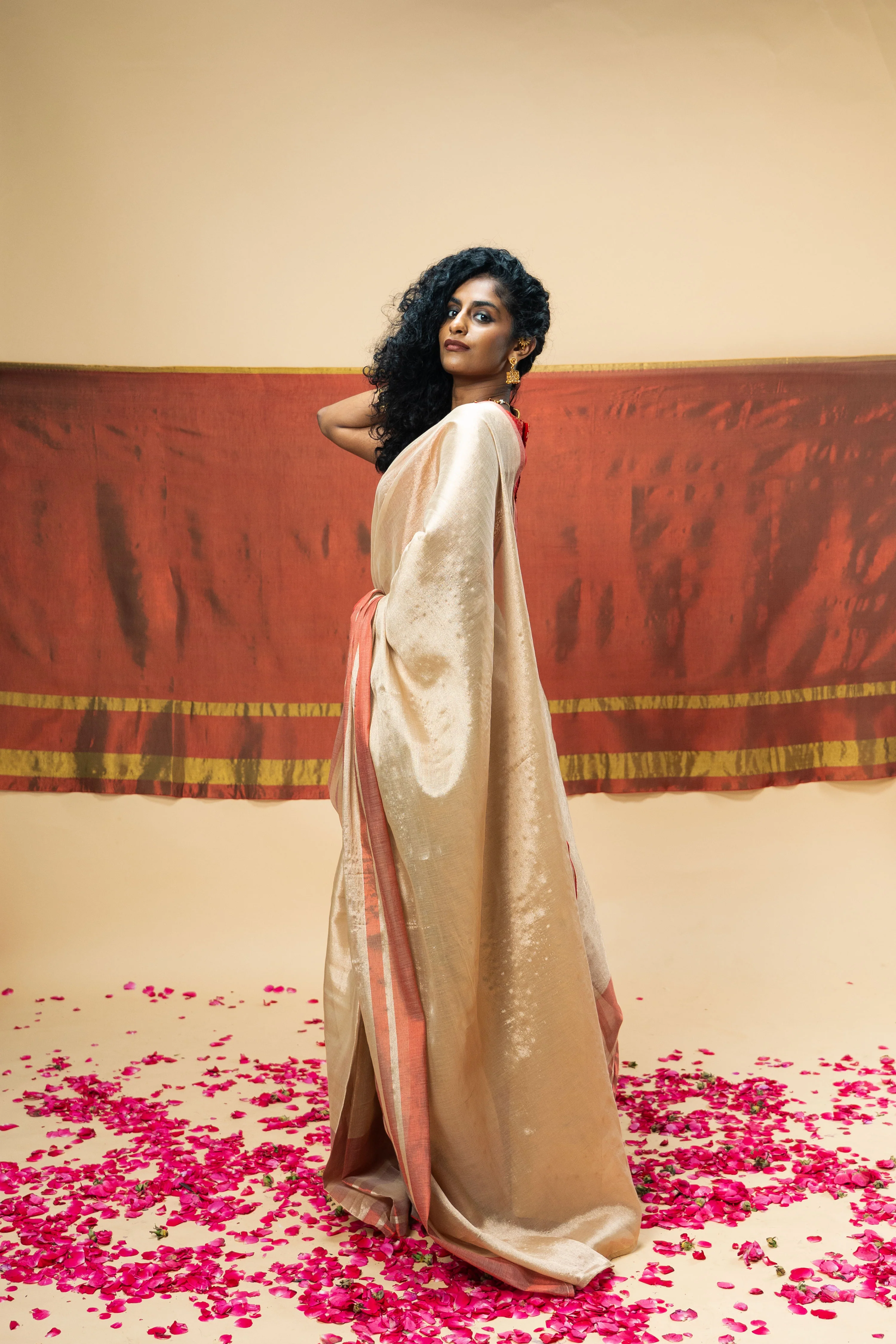 SHRAVI I Rose Gold Handwoven Tissue Saree with Red Striped Border - Image 2