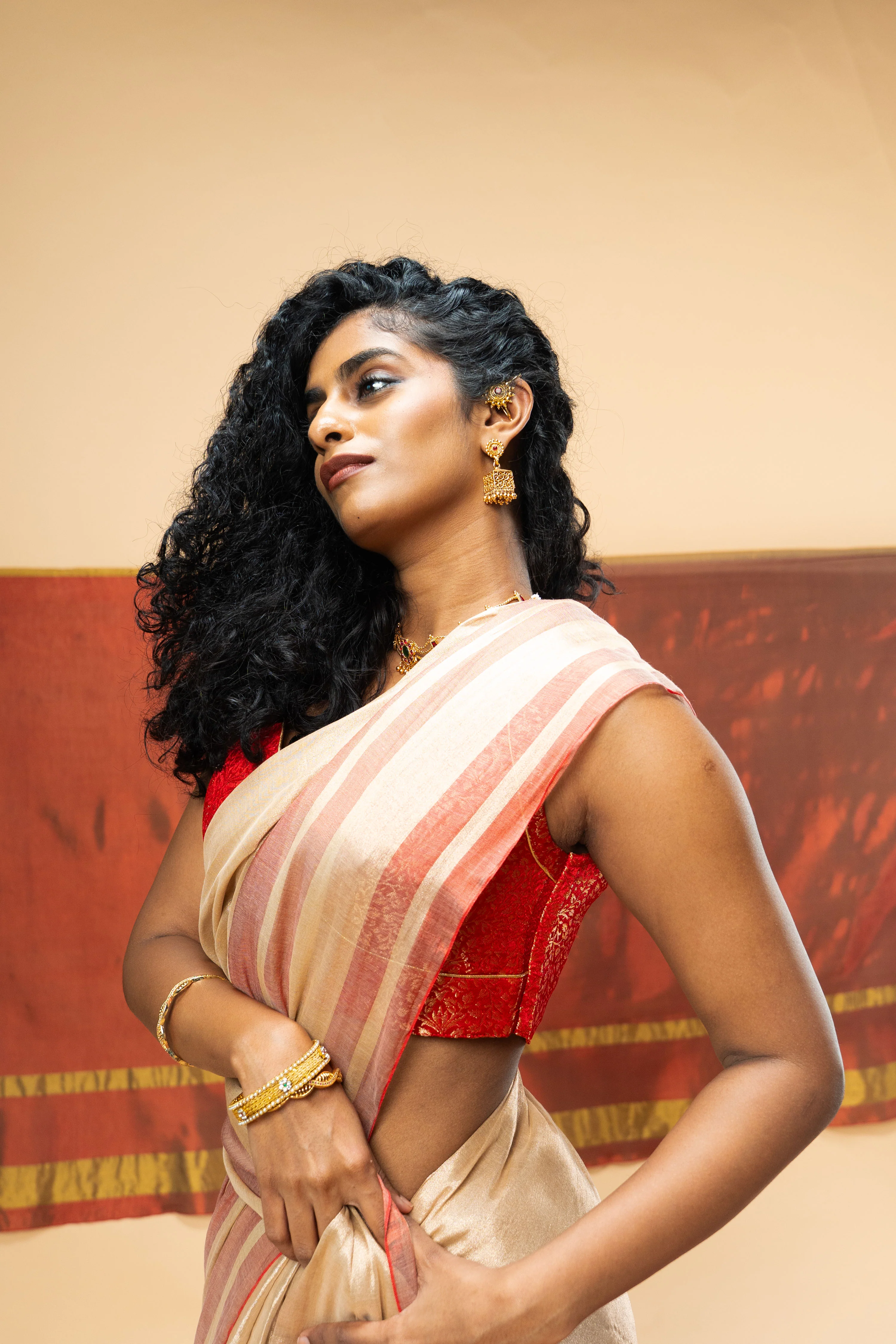 SHRAVI I Rose Gold Handwoven Tissue Saree with Red Striped Border - Image 3