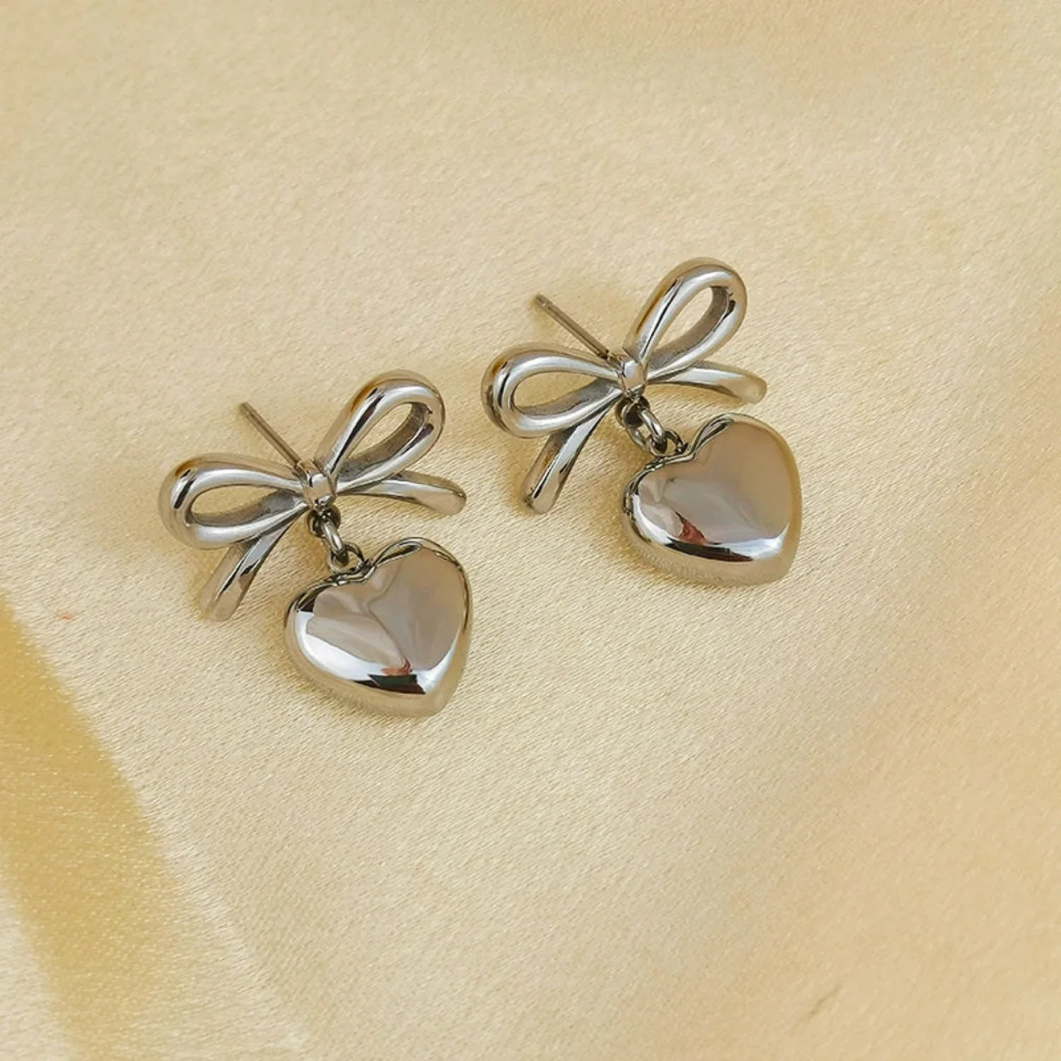 Silver Bow Heart Drop Earrings - Image 3