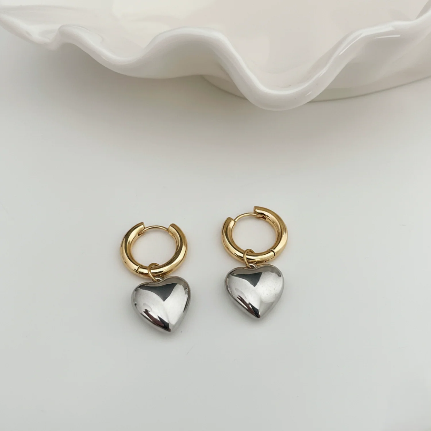 Two-Tone Heart Huggie Earrings