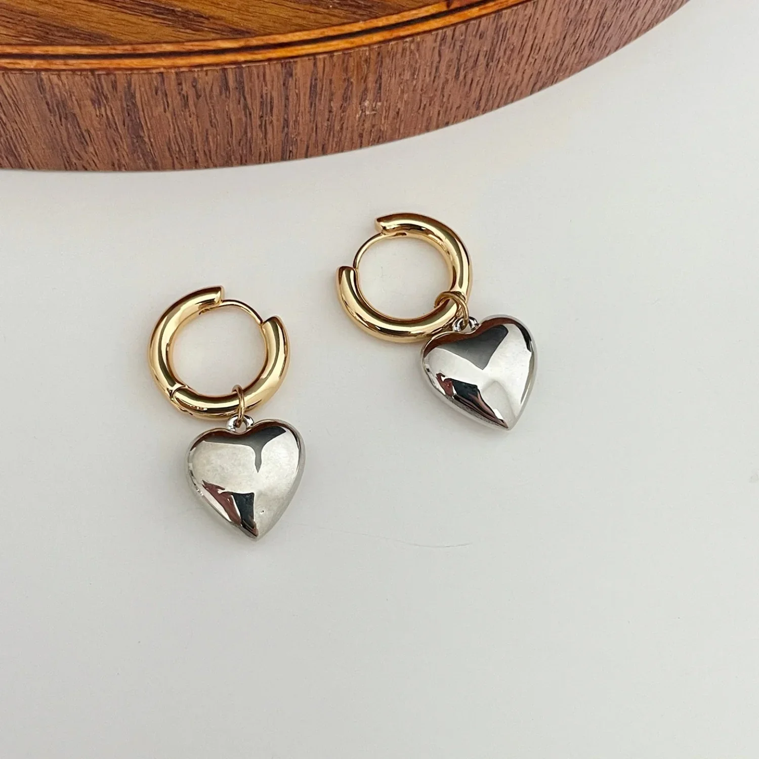 Two-Tone Heart Huggie Earrings - Image 3