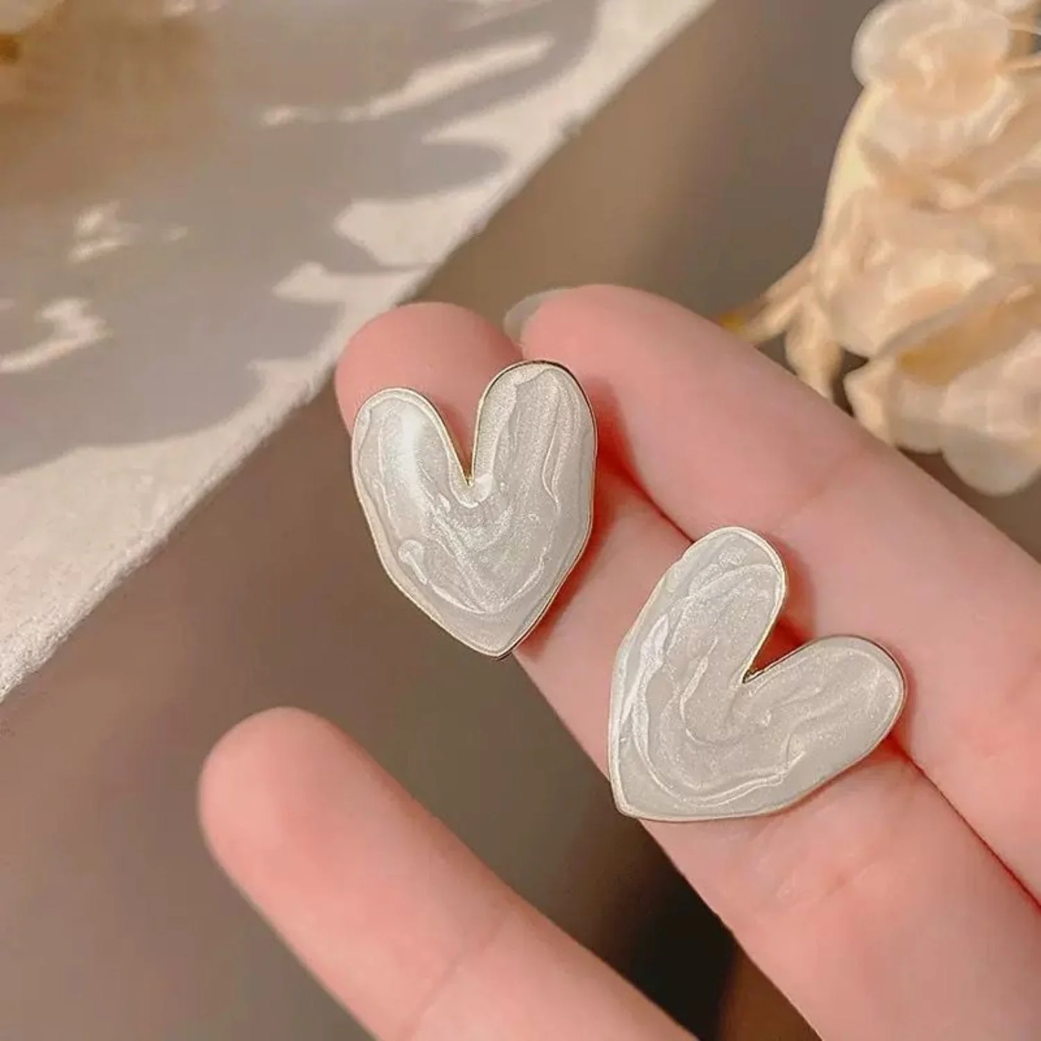 White Marble Swirl Heart Studs - Image 4