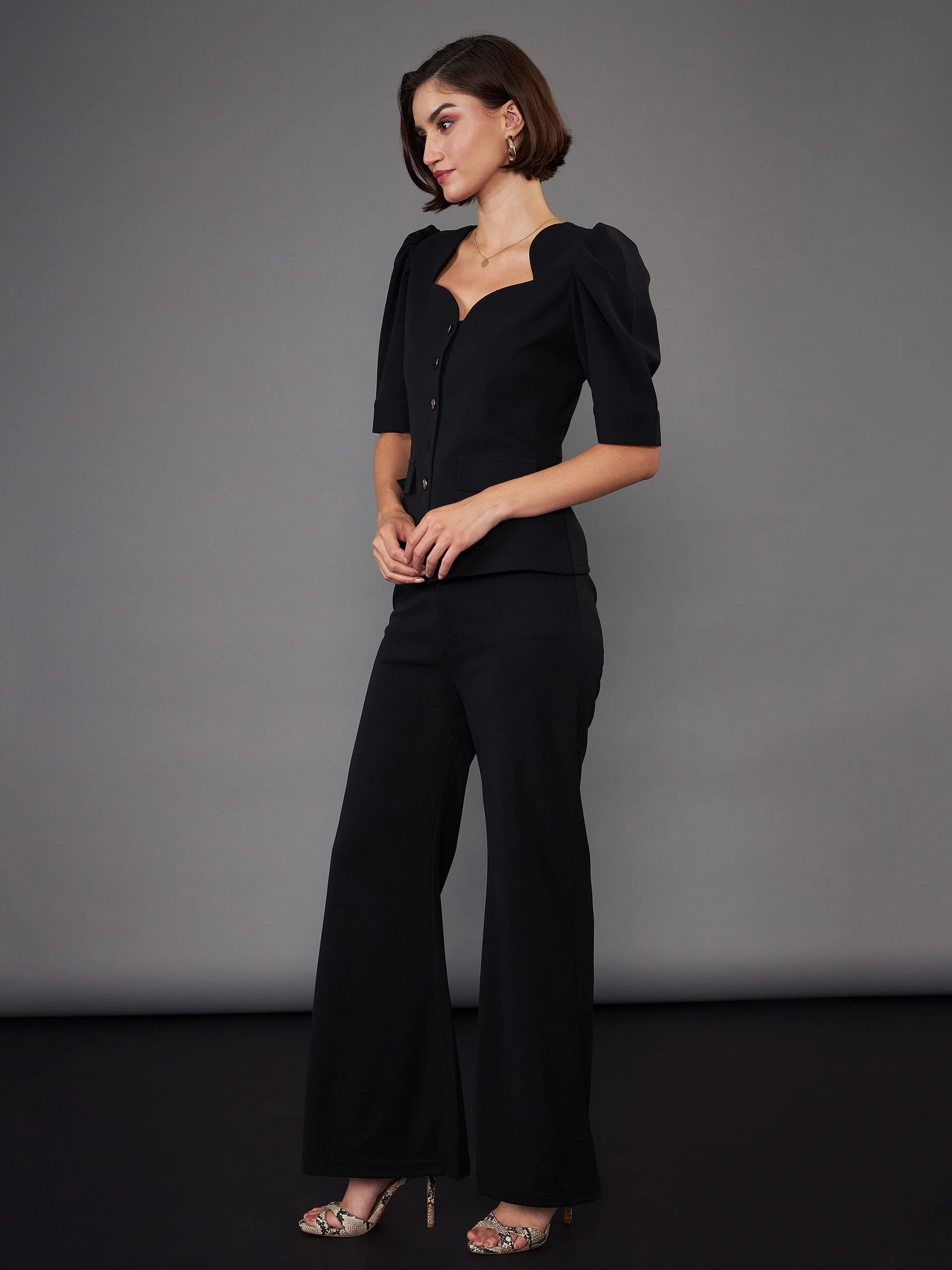 Women Black Puff Sleeves Top With Bell Bottom Pants - Image 6