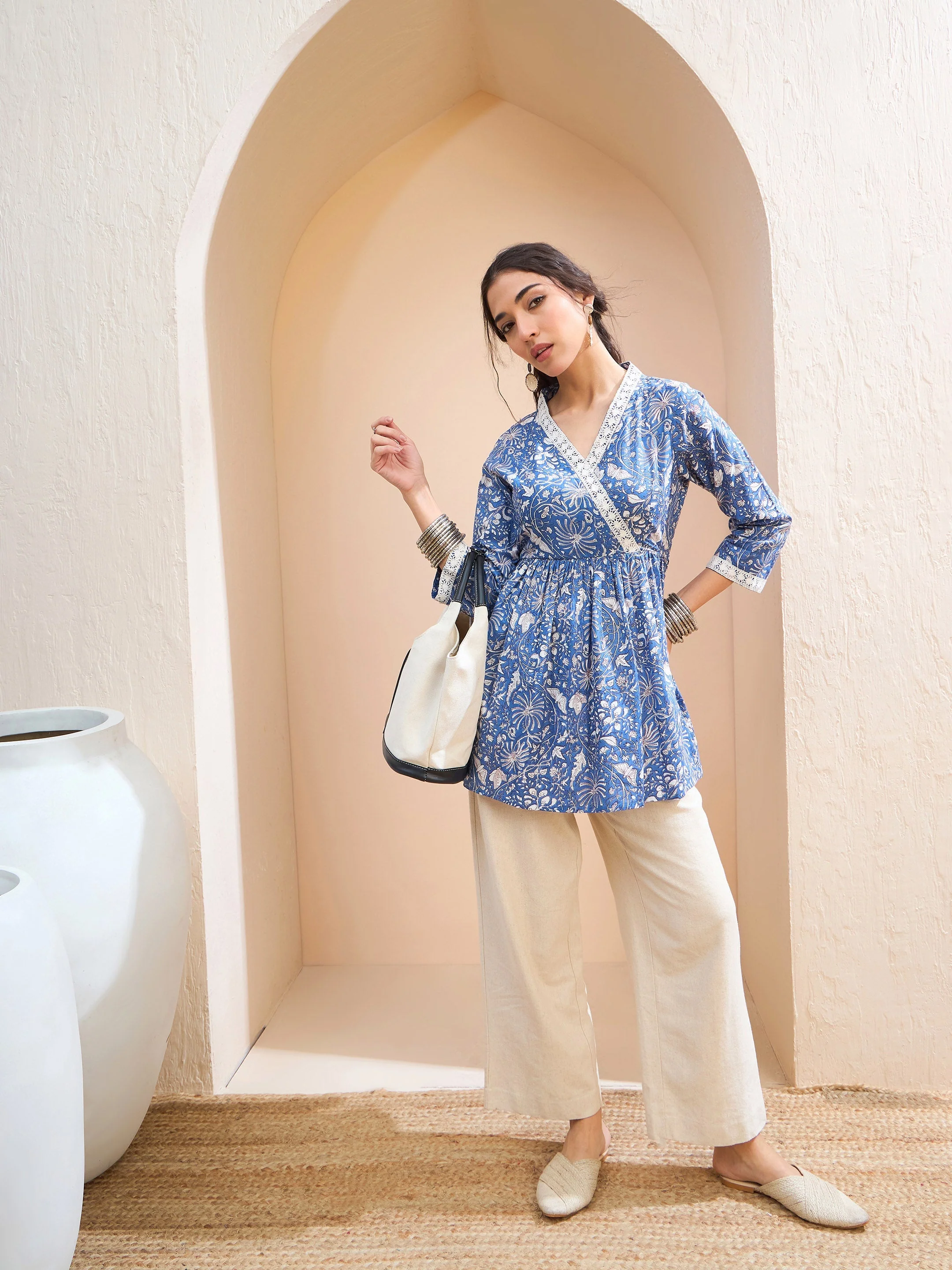 Women Blue Floral Cambric Wrap Peplum Kurti - Image 2