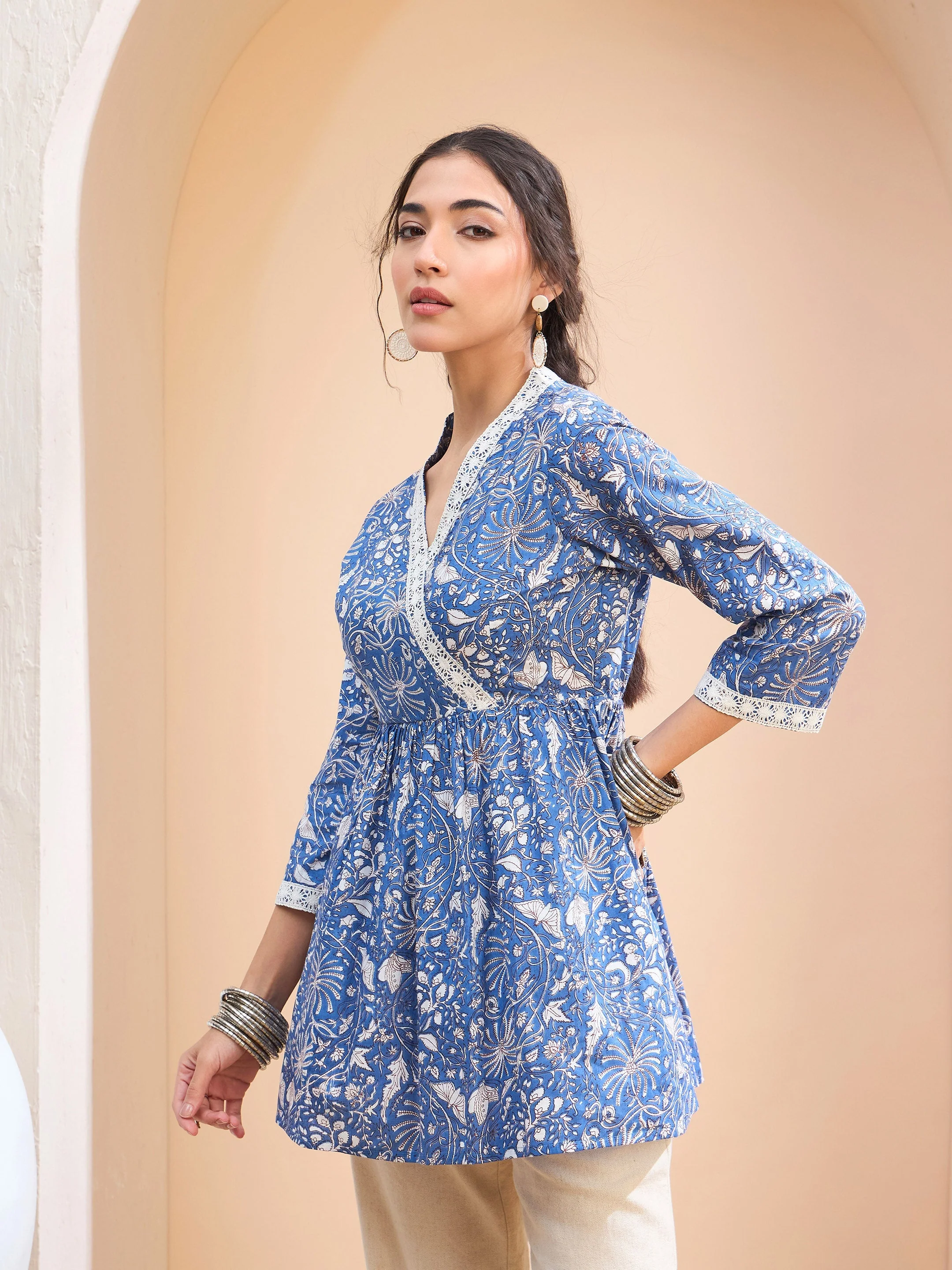 Women Blue Floral Cambric Wrap Peplum Kurti - Image 3