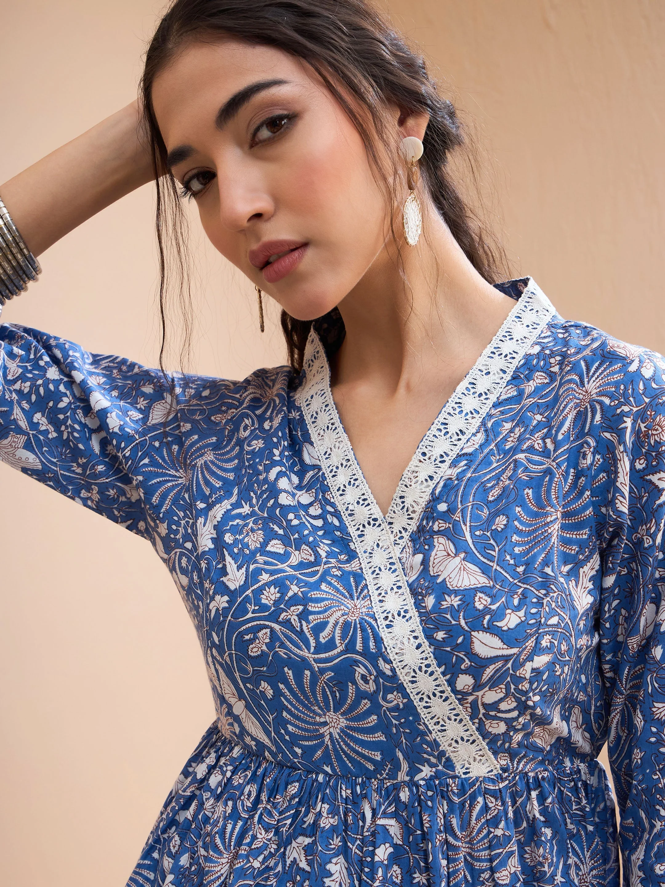 Women Blue Floral Cambric Wrap Peplum Kurti - Image 4
