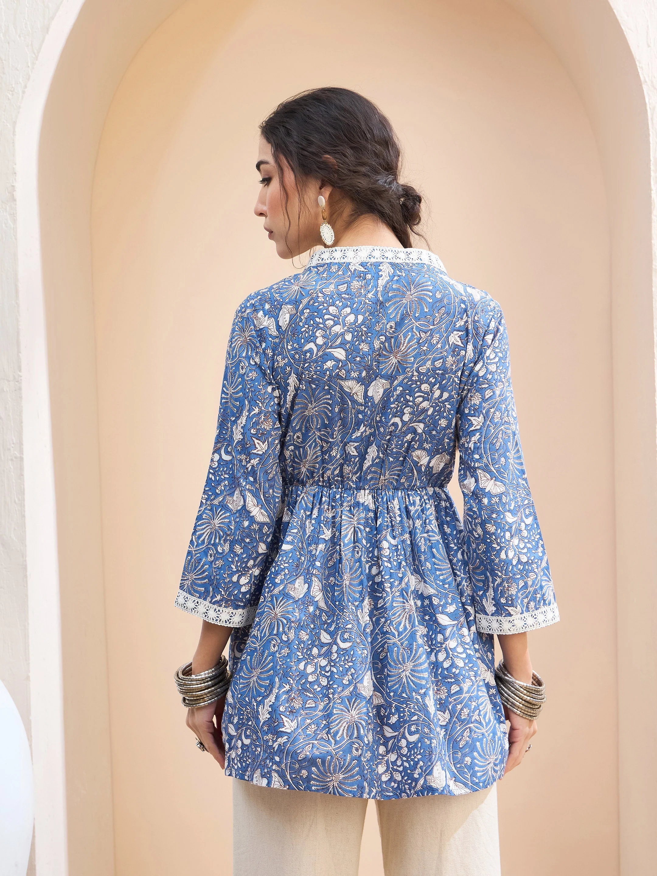 Women Blue Floral Cambric Wrap Peplum Kurti - Image 5