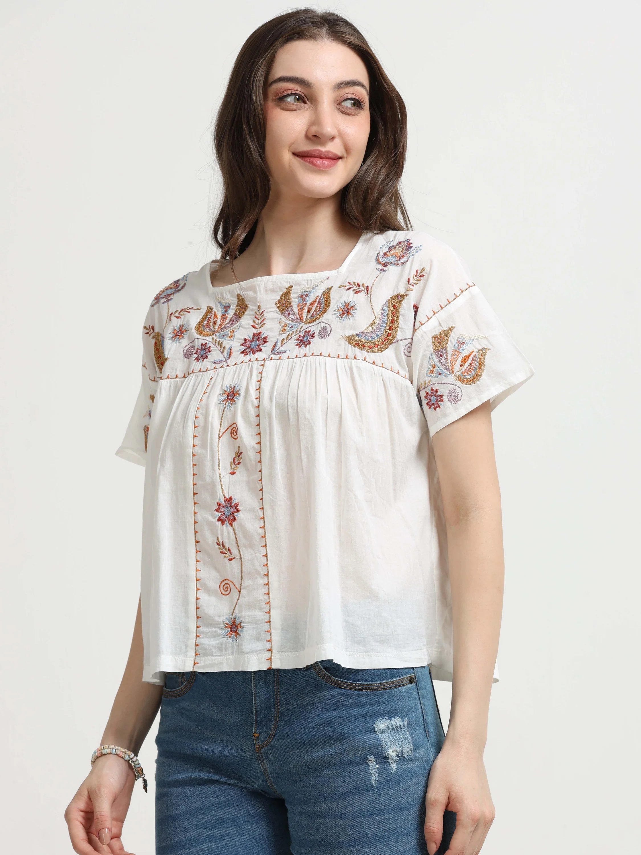 Women White Embroidered Relaxed Top - Image 2